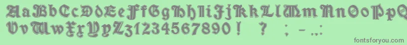 フォントMinimOutlineExtrabold – 緑の背景に灰色の文字