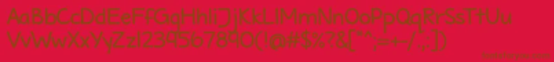MaritimeTropicalNeueBold-fontti – ruskeat fontit punaisella taustalla