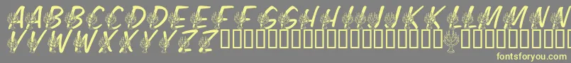 More about LmsFestivalOfLights Font LmsFestivalOfLights Font – Yellow Fonts on Gray Background