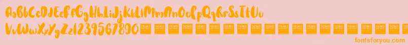 HotCakesDemo-Schriftart – Orangefarbene Schriften auf rosa Hintergrund