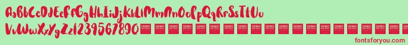 Czcionka HotCakesDemo – czerwone czcionki na zielonym tle