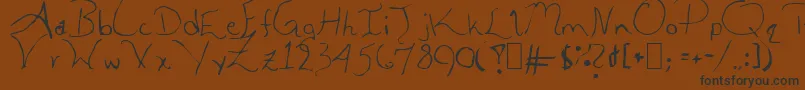 AleiaAbnormal-Schriftart – Schwarze Schriften auf braunem Hintergrund