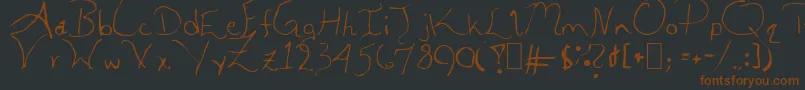 AleiaAbnormal-Schriftart – Braune Schriften auf schwarzem Hintergrund