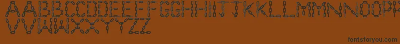 ChainLetters Font – Black Fonts on Brown Background