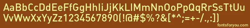 Plumbmediumc-fontti – keltaiset fontit ruskealla taustalla