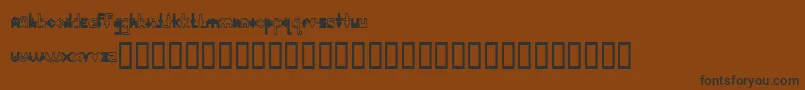 Шрифт PlasmaPoodleNormal – чёрные шрифты на коричневом фоне