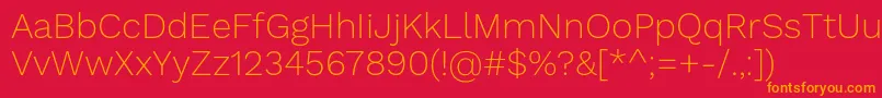 WorksansExtralight Font – Orange Fonts on Red Background