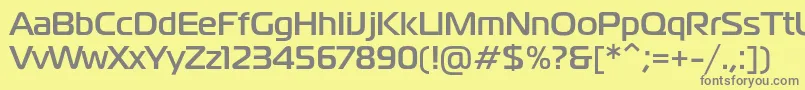 フォントMagistralcBold – 黄色の背景に灰色の文字