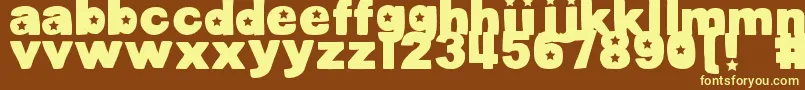 DjbCutoutsStars Font – Yellow Fonts on Brown Background