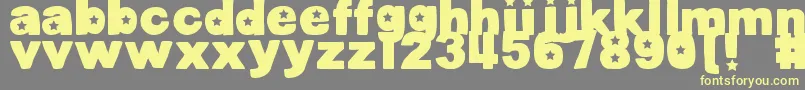 DjbCutoutsStars Font – Yellow Fonts on Gray Background