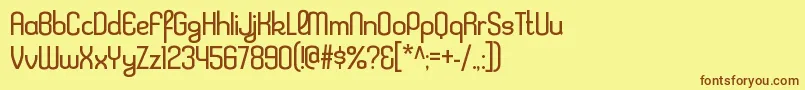KleptocracyltRegular Font – Brown Fonts on Yellow Background