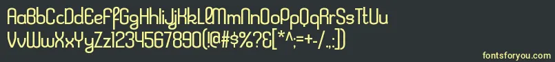 KleptocracyltRegular Font – Yellow Fonts on Black Background