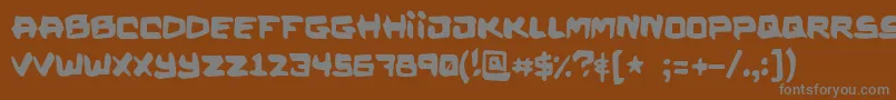 フォントKalysterine – 茶色の背景に灰色の文字
