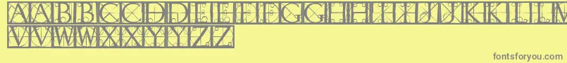 Capsrandomishbricks Font – Gray Fonts on Yellow Background