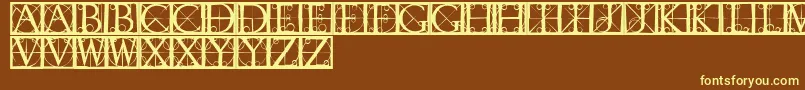 フォントCapsrandomishbricks – 黄色のフォント、茶色の背景