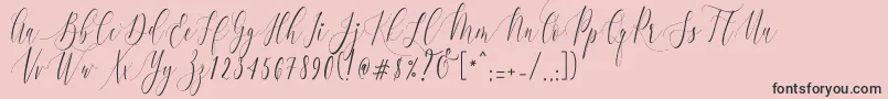 Fonte CharlotteCalligraphyR1 – fontes pretas em um fundo rosa