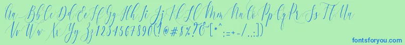 CharlotteCalligraphyR1 Font – Blue Fonts on Green Background