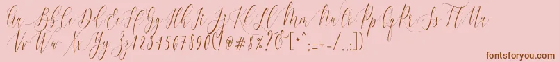 CharlotteCalligraphyR1-fontti – ruskeat fontit vaaleanpunaisella taustalla