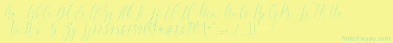 フォントCharlotteCalligraphyR1 – 黄色い背景に緑の文字