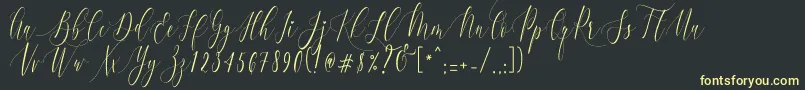 CharlotteCalligraphyR1 Font – Yellow Fonts on Black Background