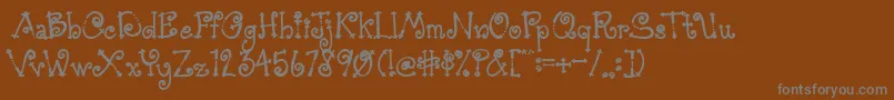 AustieBostSimpleSimon-fontti – harmaat kirjasimet ruskealla taustalla