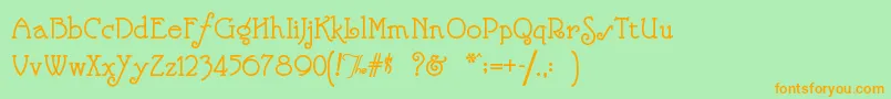 フォントNickelod – オレンジの文字が緑の背景にあります。