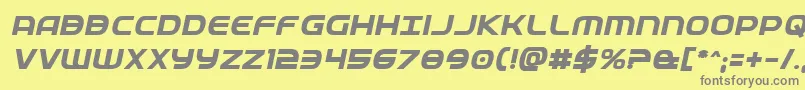 フォントFedserviceboldital – 黄色の背景に灰色の文字