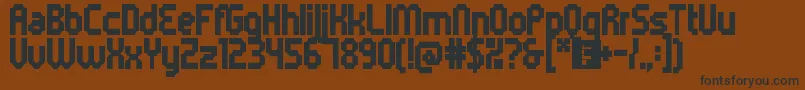 5metrikBlackCondensed-fontti – mustat fontit ruskealla taustalla