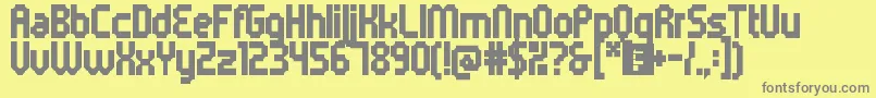 5metrikBlackCondensed-fontti – harmaat kirjasimet keltaisella taustalla