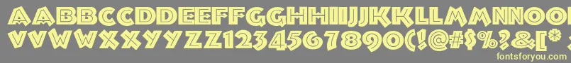 Troglodytenf Font – Yellow Fonts on Gray Background