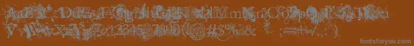 JellykaEvanAndEstrya-fontti – harmaat kirjasimet ruskealla taustalla