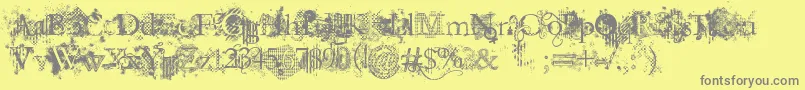 JellykaEvanAndEstrya-fontti – harmaat kirjasimet keltaisella taustalla