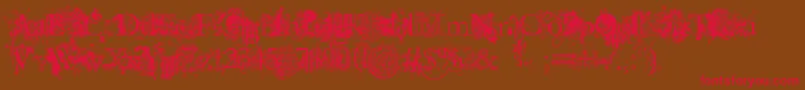 JellykaEvanAndEstrya-fontti – punaiset fontit ruskealla taustalla