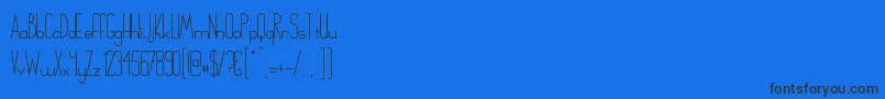 Czcionka Chinger – czarne czcionki na niebieskim tle