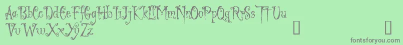 フォントLigeiaDemo – 緑の背景に灰色の文字