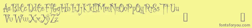 フォントLigeiaDemo – 黄色の背景に灰色の文字