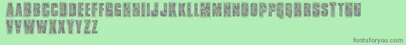 Vtksbandana-fontti – harmaat kirjasimet vihreällä taustalla