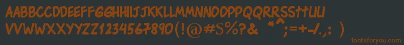 Шрифт EdsonComicsBold – коричневые шрифты на чёрном фоне