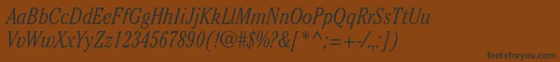 CheltenhamstdLightcondit Font – Black Fonts on Brown Background