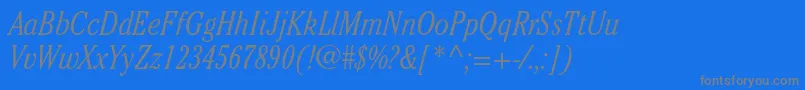 CheltenhamstdLightcondit-fontti – harmaat kirjasimet sinisellä taustalla