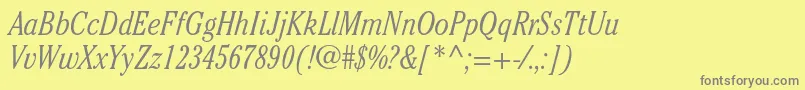 CheltenhamstdLightcondit-fontti – harmaat kirjasimet keltaisella taustalla