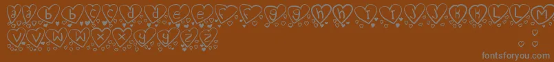 Czcionka LoveYouTooTfb – szare czcionki na brązowym tle