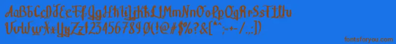 Teitheas Font – Brown Fonts on Blue Background