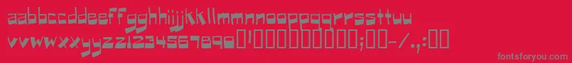 フォントPuckfont – 赤い背景に灰色の文字