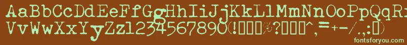 フォントEsathnrml – 緑色の文字が茶色の背景にあります。