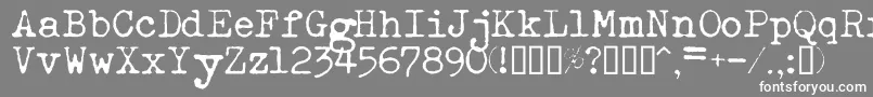 フォントEsathnrml – 灰色の背景に白い文字