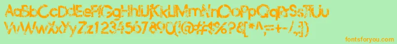 Frailbedazzled-Schriftart – Orangefarbene Schriften auf grünem Hintergrund