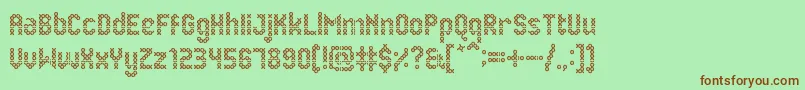 EenvoudigeBatik Font – Brown Fonts on Green Background