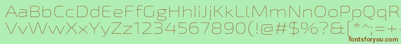 フォントExo2Thinexpanded – 緑の背景に茶色のフォント
