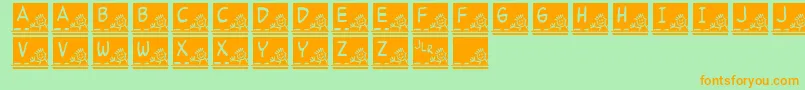 JlrSchoolSlate Font – Orange Fonts on Green Background